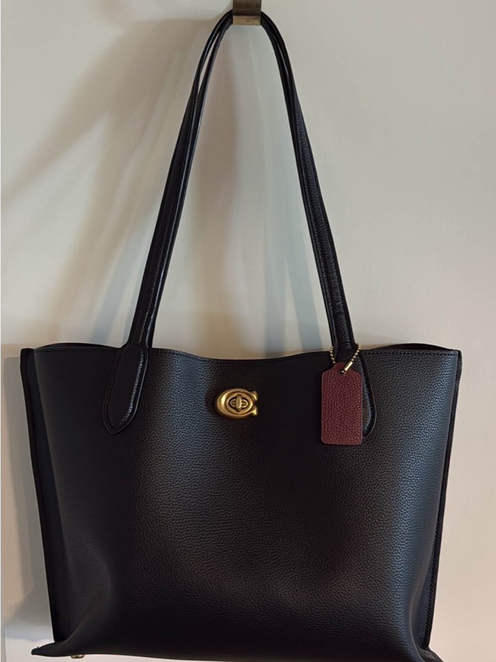 Coach Black Pebbled Leather Tote with Gold Turnlock and Burgundy Tag